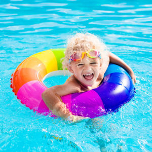 child swimming safely