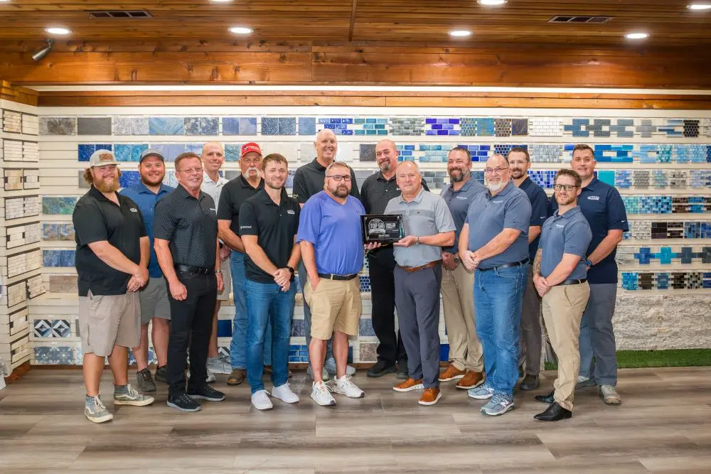 Picture of the Gohlke Pools Construction Team with their Top 50 Pool Builder award.